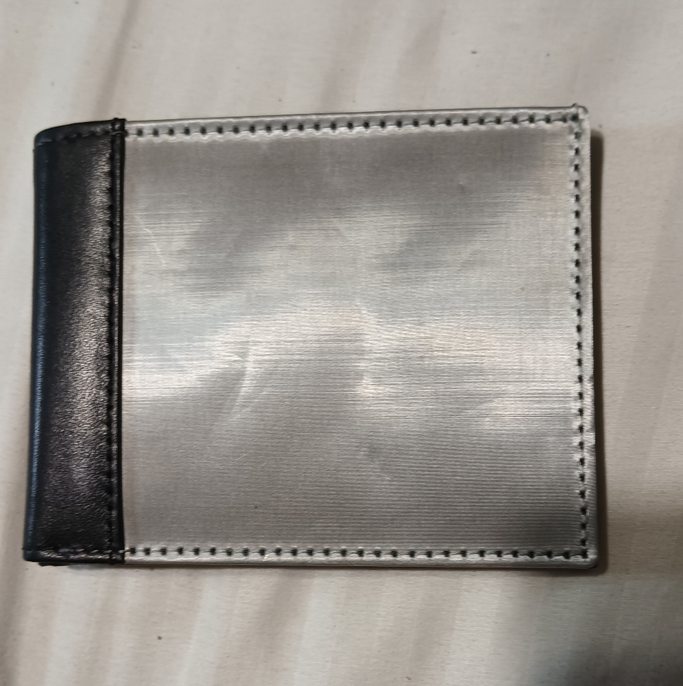 Stewart Stand steel wallet, slightly used.